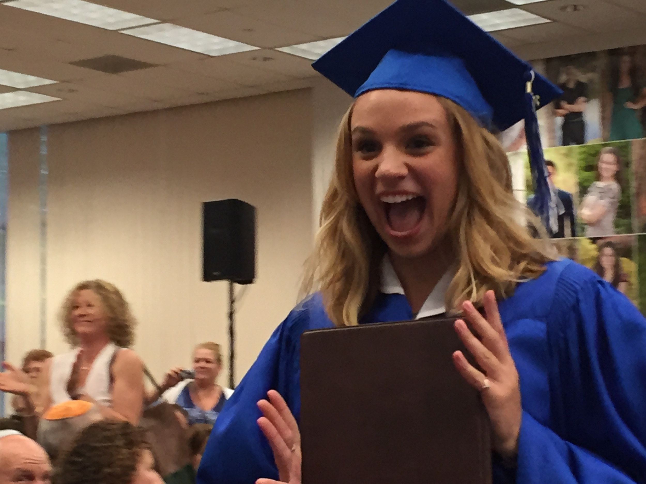 Neice ilana upon receiving her high school diploma, getting ready to fly the coop. 