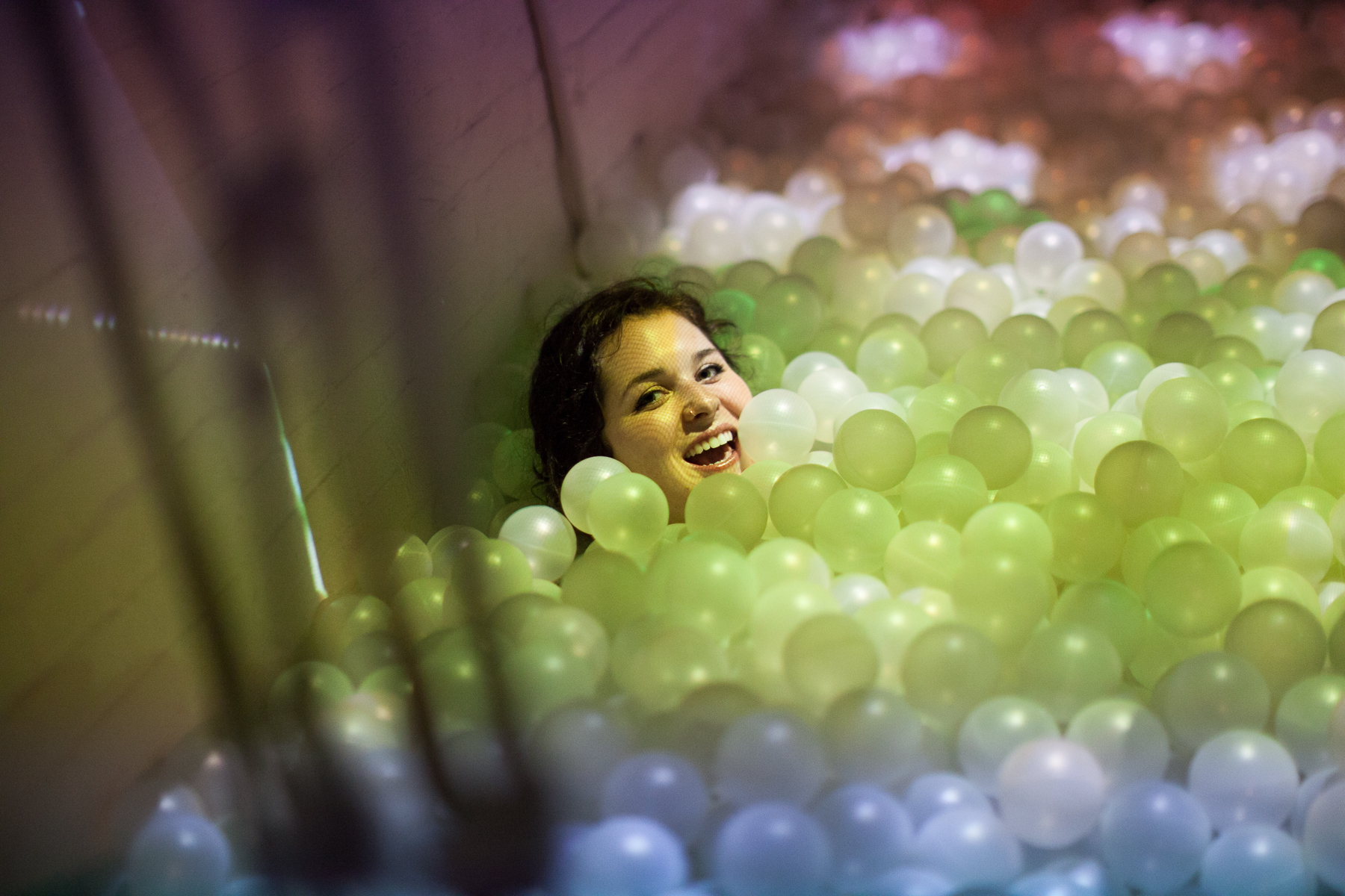 Playing in a Charlestown art gallery with an adult-sized ball pit. Why doesn't every gallery have this?