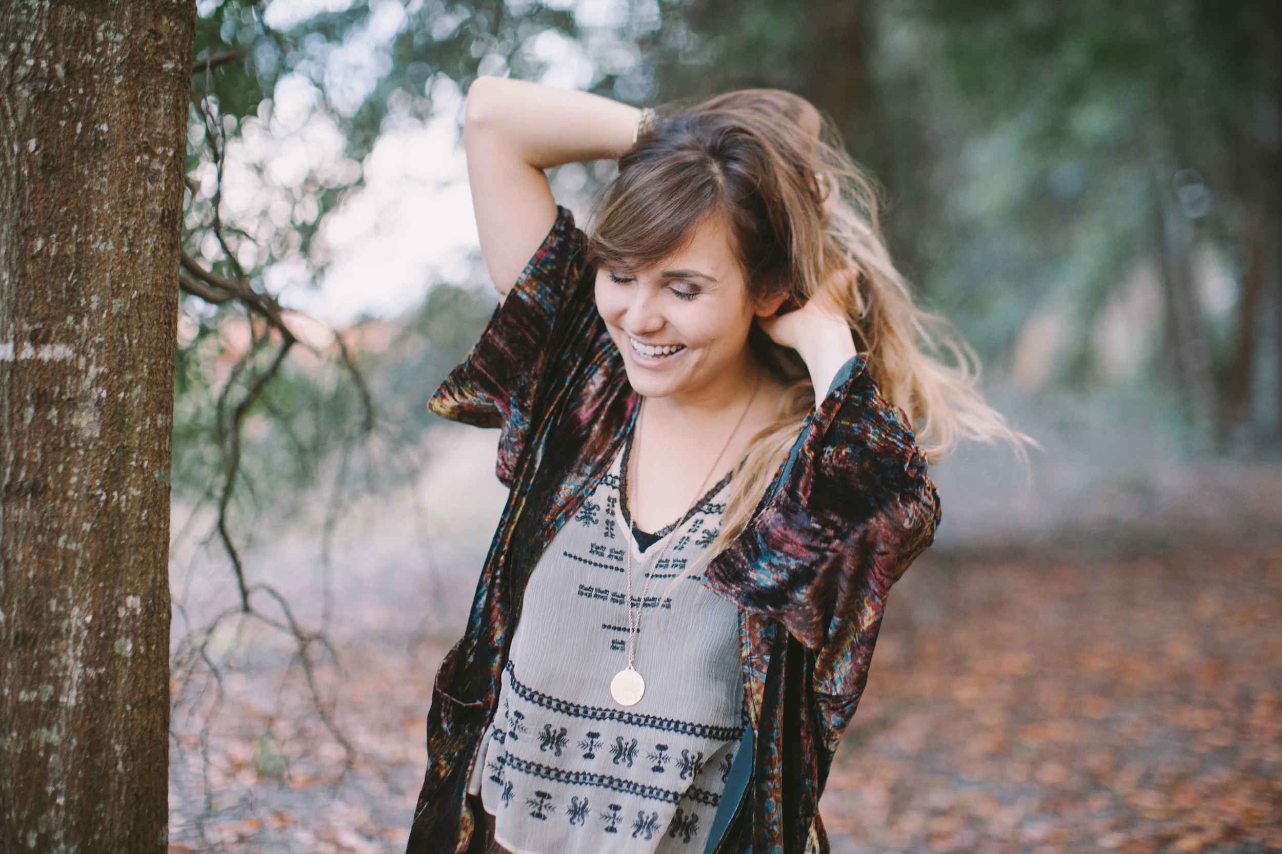 My friend Tamara snapped this of me, smiling 'cause it's 80 in December! Wish you were here! <3