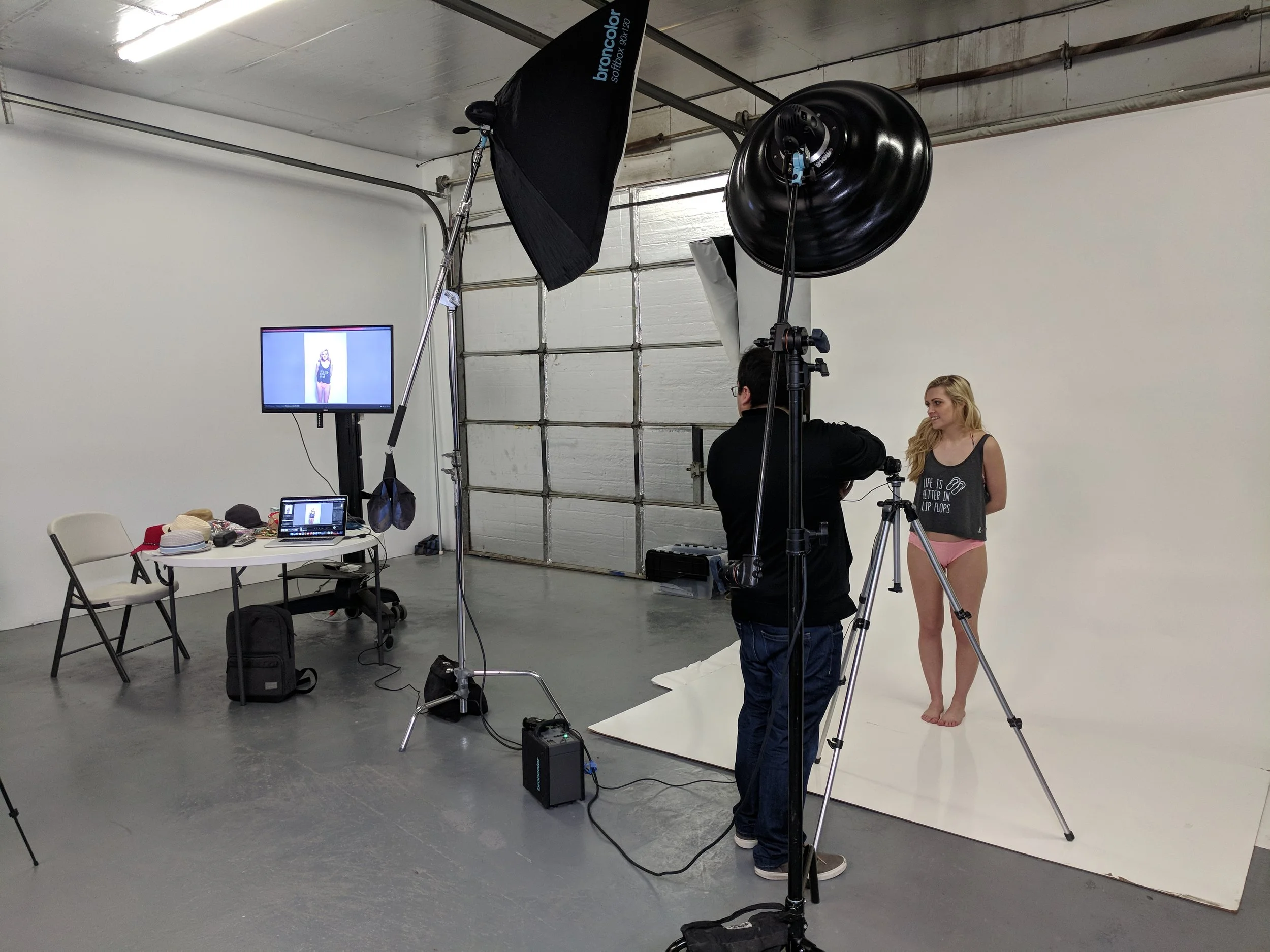 Using our rolling tether monitor for review (photographer provides laptop)