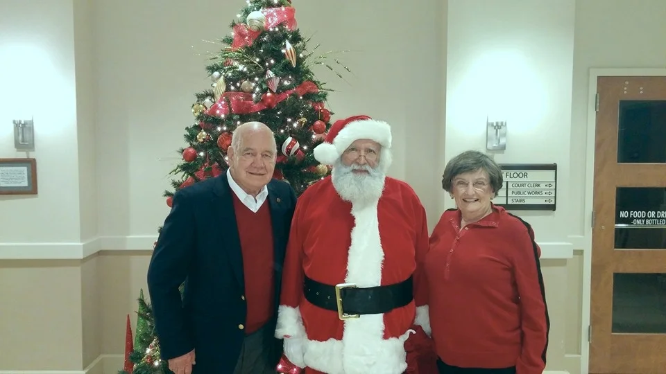 Mayor Alexander, Santa Claus, and Ms. Janice Green.