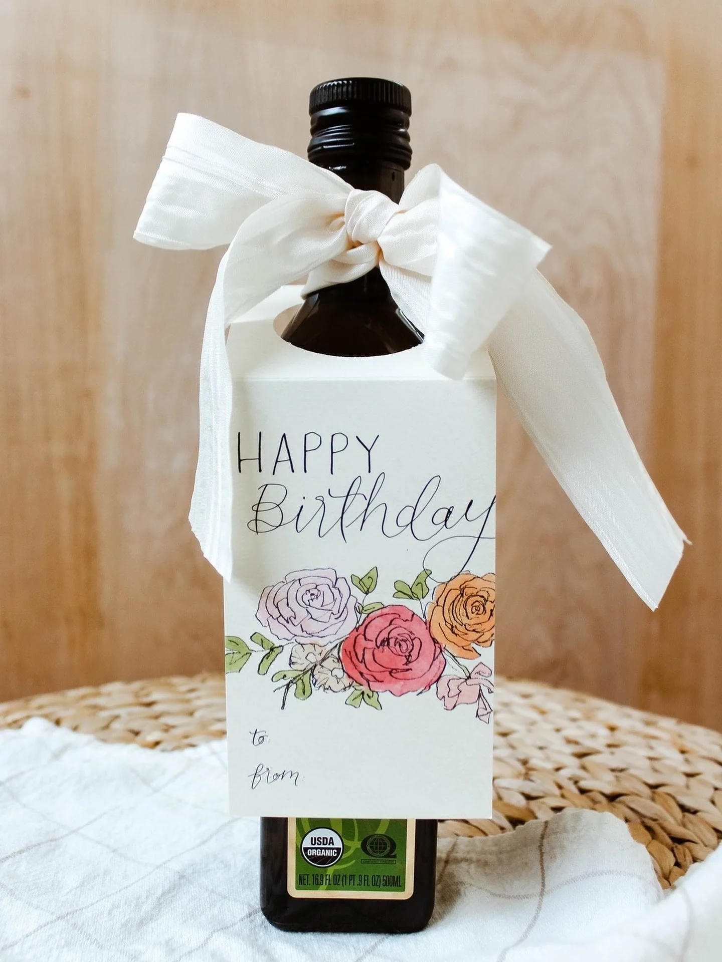 cute little gift idea for all of those holiday parties you&rsquo;ve got coming up &mdash;

a wine bottle or fun bottle of olive oil, fancied up with one of our cute gift tags &amp; ribbon! it&rsquo;s an easy, practical last minute gift that anyone ca