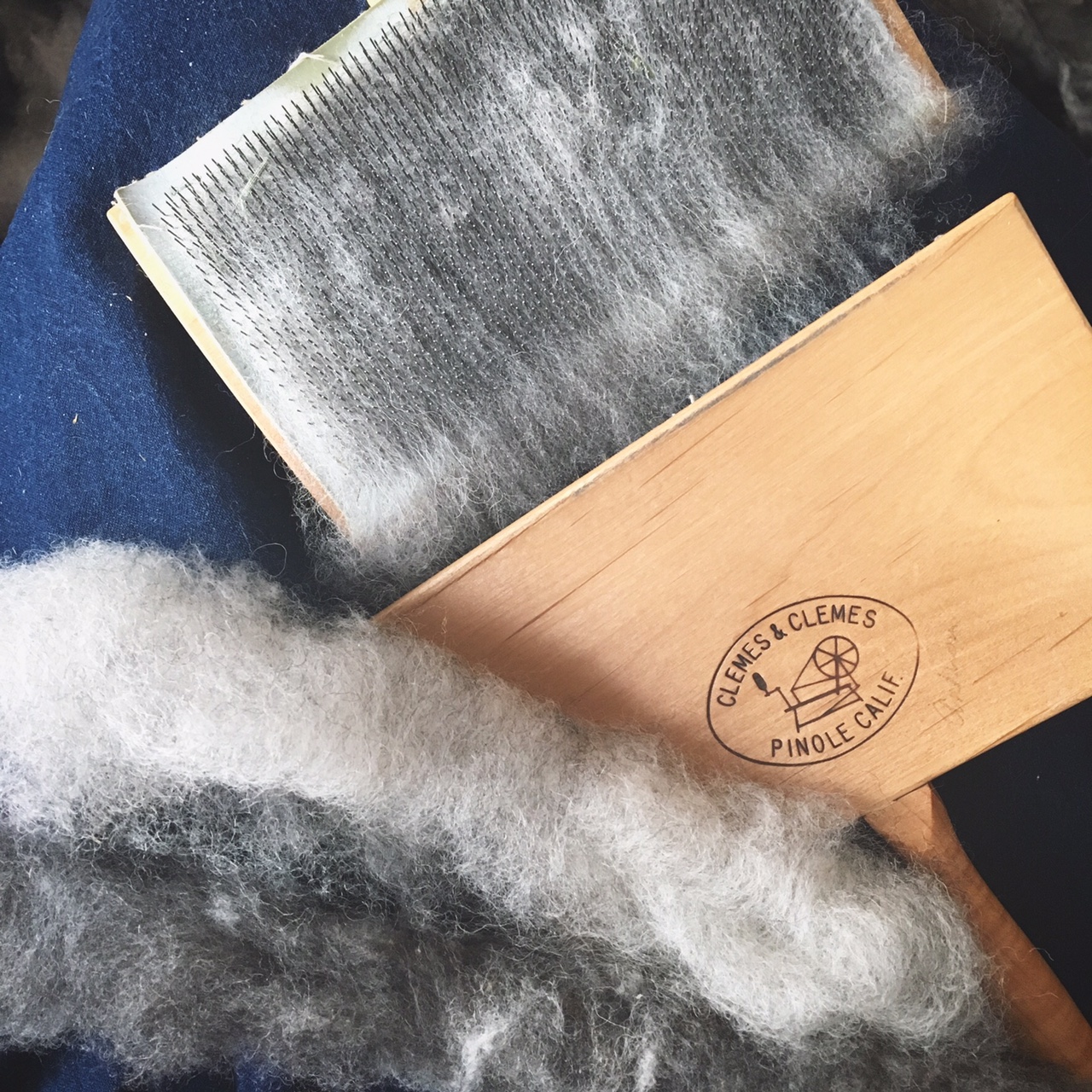Hand carding some Jacobs Fleece