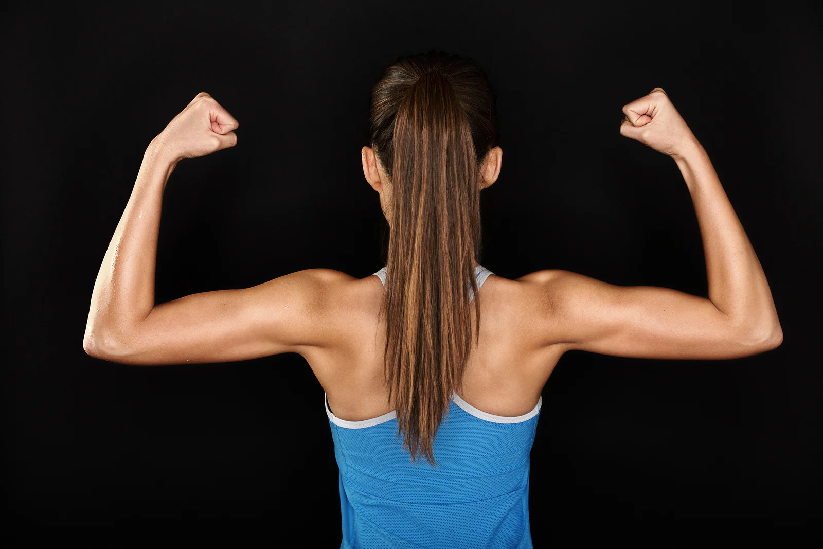 bigstock-Strong-fitness-woman-showing-b-43266079.jpg