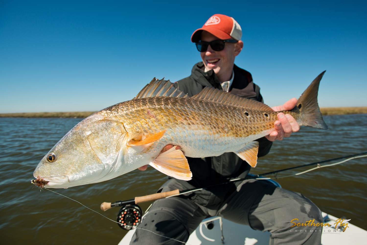 Fly fishing for huge redfish louisiana with southern fly expeditions and captain brandon keck 