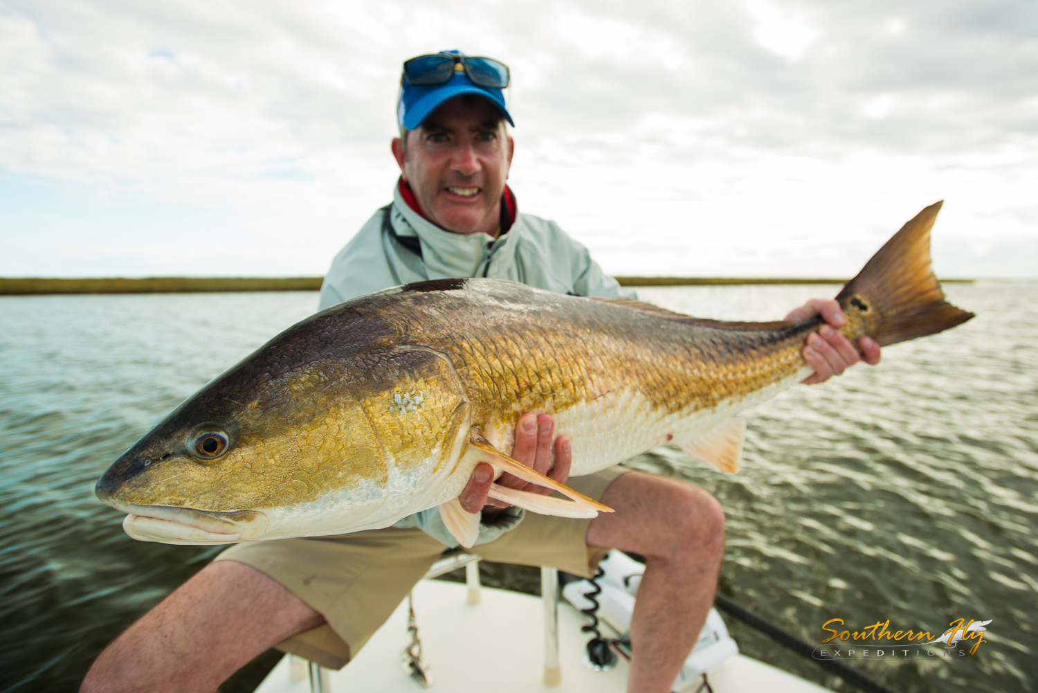 Fly Fishing for monster redfish in the louisiana marsh area with Southern Fly Expeditions 