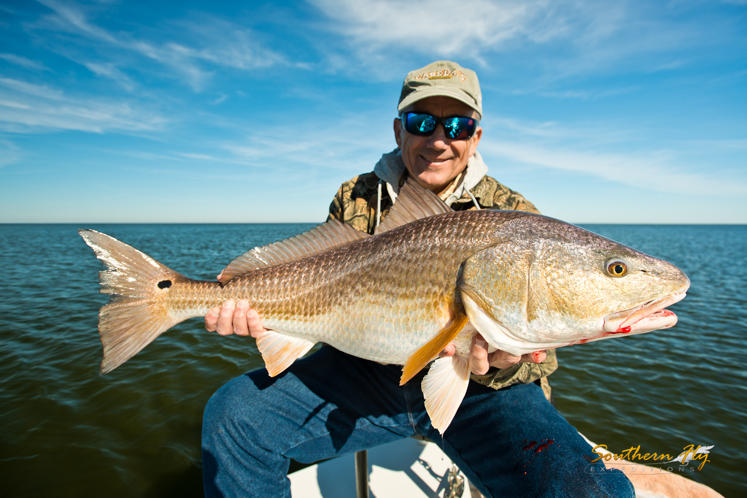 Spin Fishing Bull Reds with Fly Fishing Charter Southern Fly Expeditions