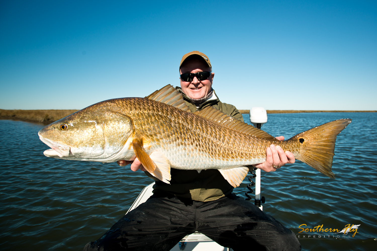 fly fishing for huge redfish with southern fly expeditions