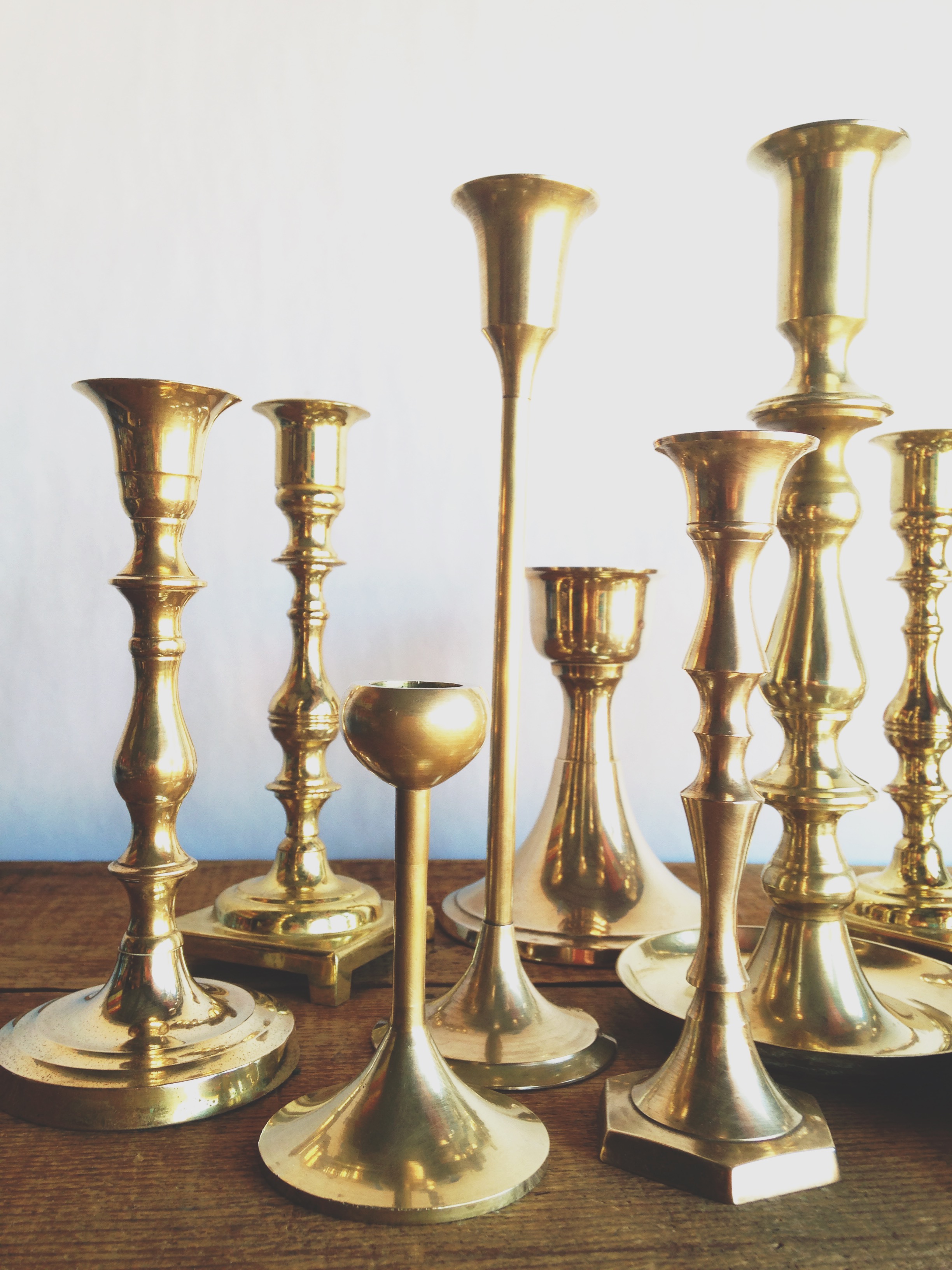 Rent Mismatched Small Brass Candlesticks