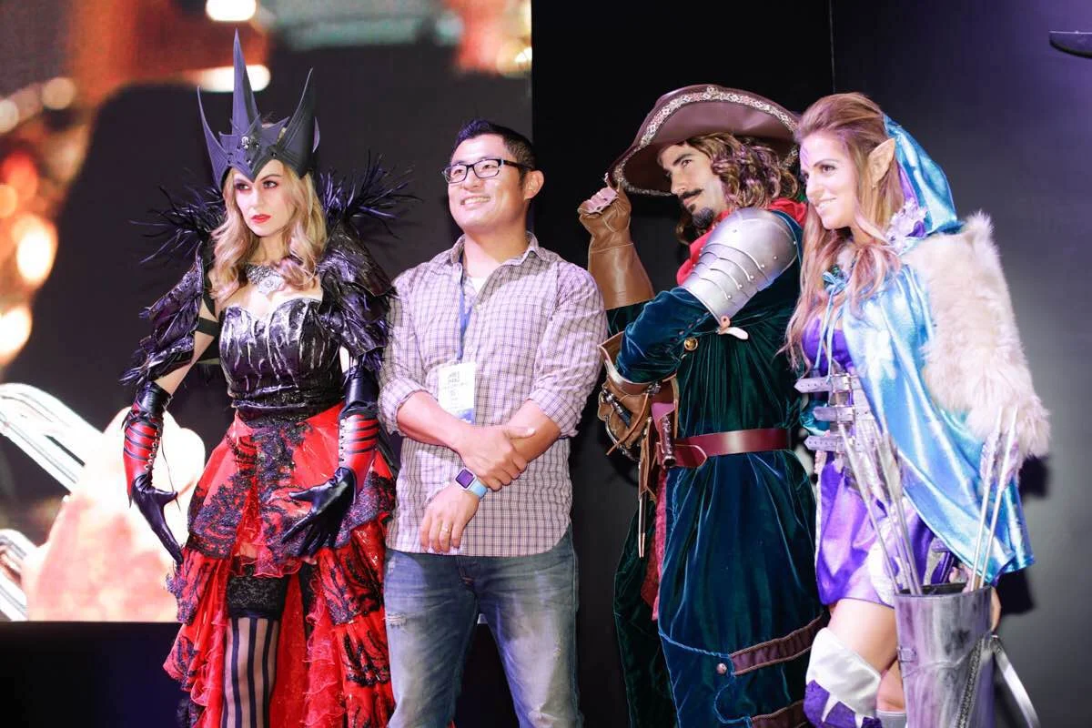 Concept Art House CEO, James Zhang, at the Relics of Gods booth.