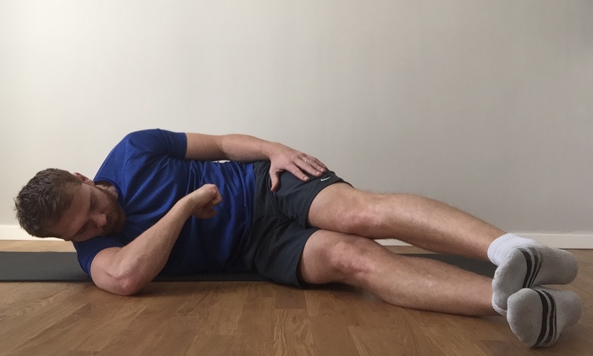 Isometric contraction towards ground.