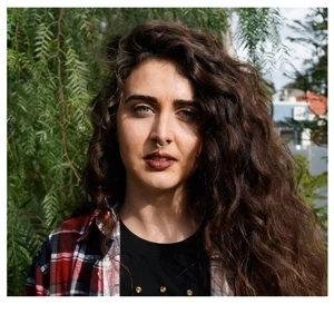 Hannah Donnelly is a Wiradjuri woman from NSW who grew up on Gamilaroi country in Tingha and Inverell. Creator of Sovereign Trax music blog and Co-editor of the Sovereign Apocalypse zine. She also writes for Indigenous music culture website Revoluti…