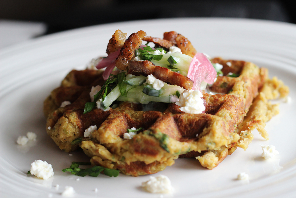 Writer and stand-up comic Amanda Brooke Perrin eats falafel waffles at brunch with Host Mike Christie and talks comedy writing, 241 pizza, and therapy.