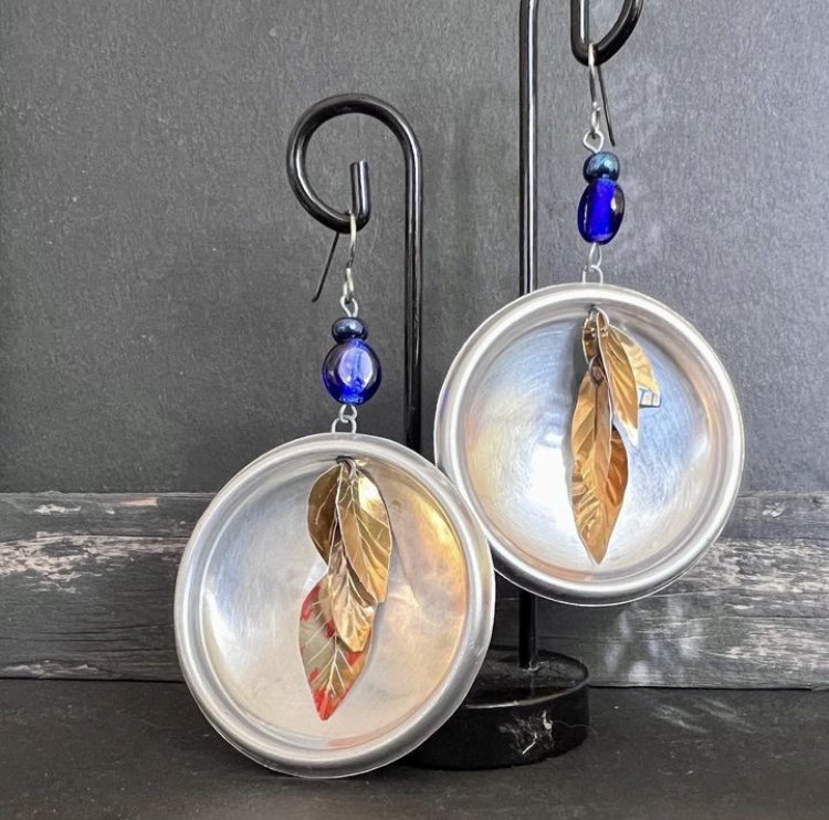 Upcycled aluminum earrings, created and donated by Dana Noble