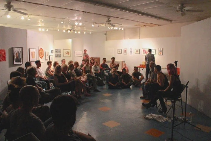 Copy of performance-panel-in-gallery-w-audience.jpg