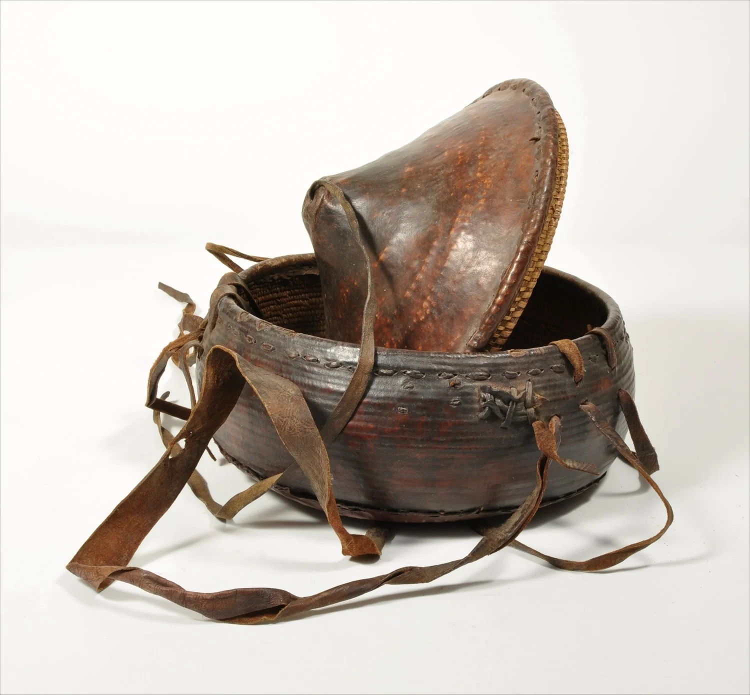 Antique Ethiopian leather and woven reed flat bread box