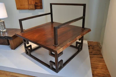 Designed and made by Jan Lee, this "meditation chair" is inspired by Ming dynasty examples which provided a raised platform for one to meditate upon. It is made from African Bubinga wood, and American walnut. It is comprised of over seventy mortise and tenon joints. $4000.00 25% of your purchase will go to Hamilton Madison House !
