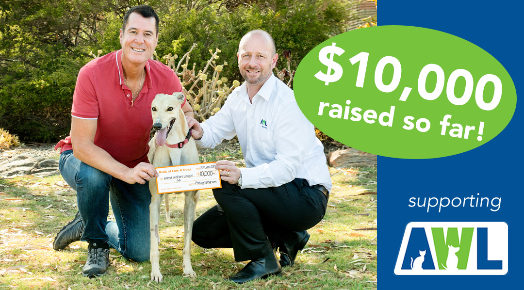 Multi-Award Winning Photographer Mark Trumble presenting a cheque to Richard Mussel, CEO of the Animal Welfare League SA