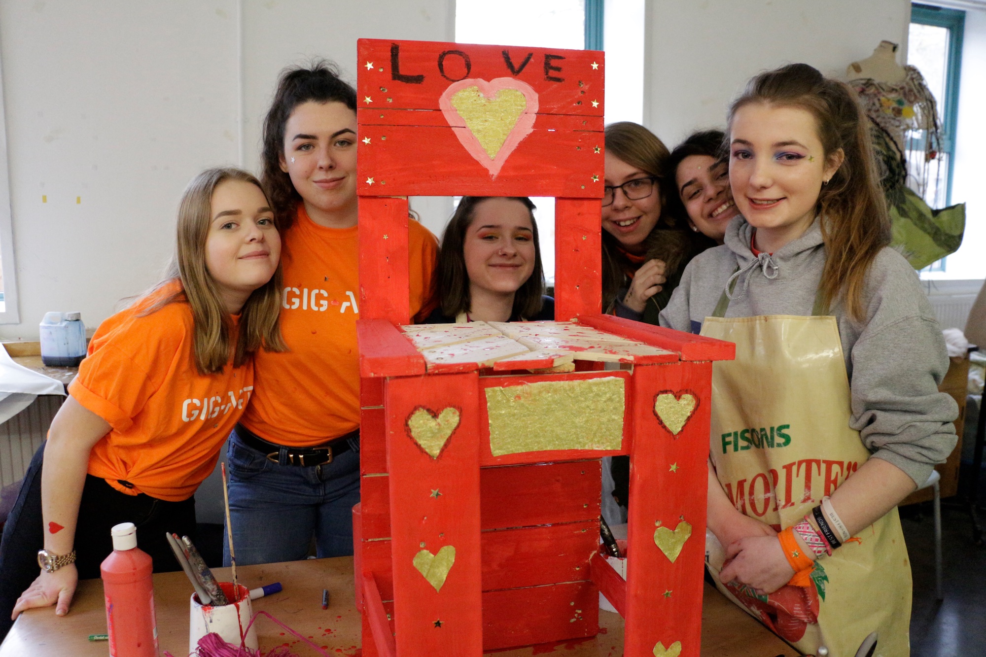 Performing Arts Students from the City of Oxford College creating colourful artworks to give to a local school.