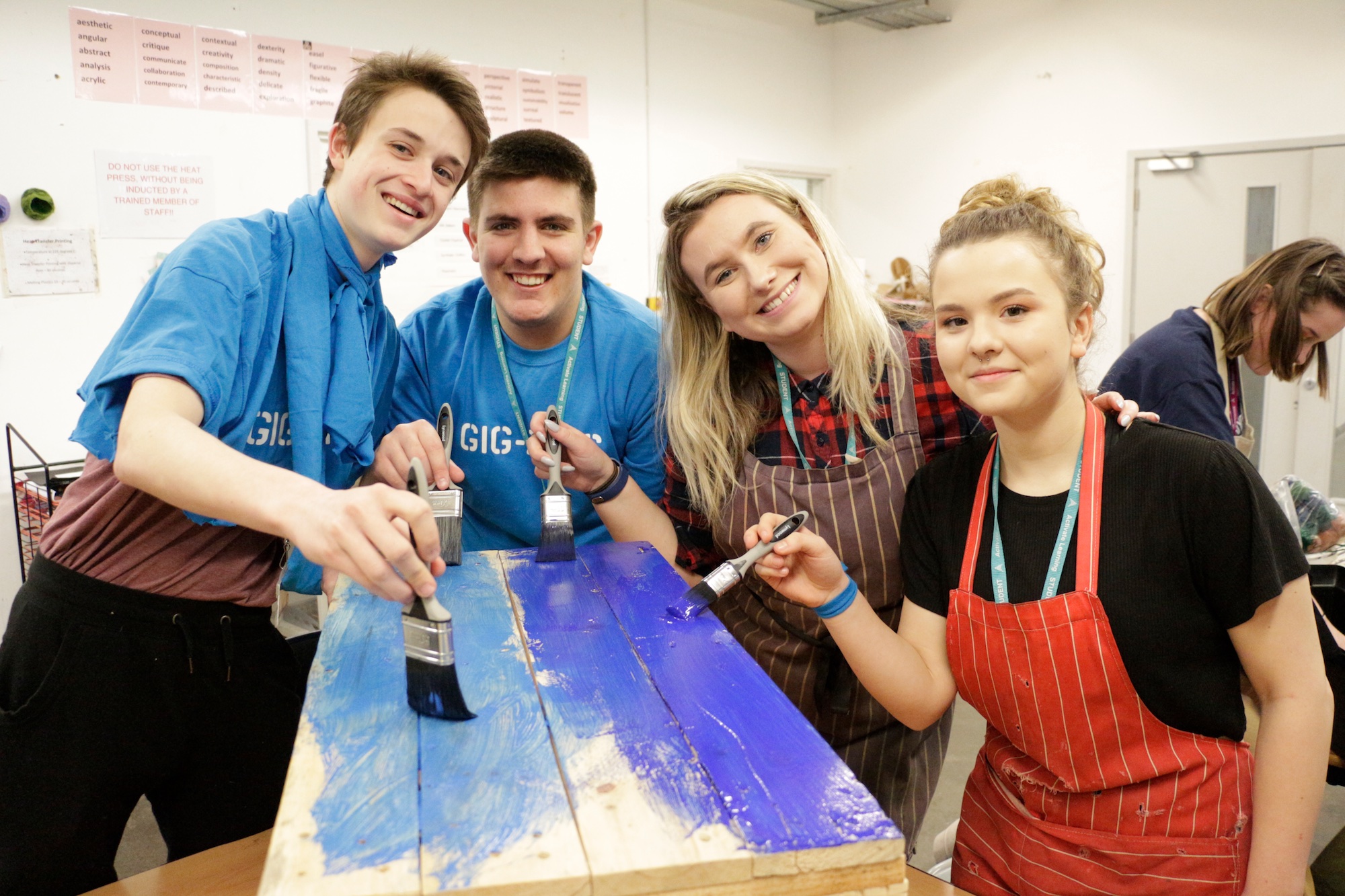 Great collaboration - Students creating colourful artworks for the community.