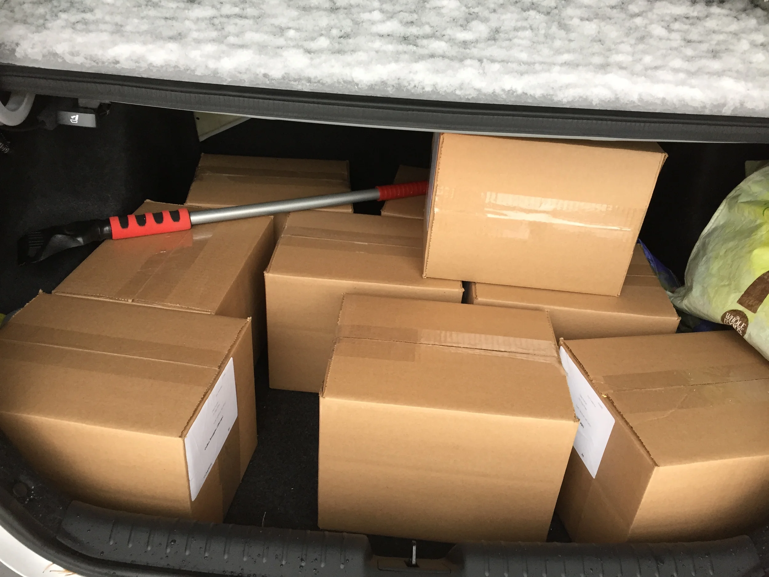 250 Books in my trunk providing extra traction in the snow.