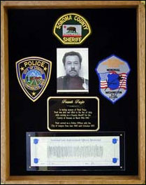 Photograph of Trejo memorial dedicated by and residing at the Lompoc Police Department.