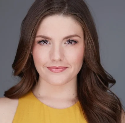 Sarah Beckham-Turner Headshot Yellow.jpeg