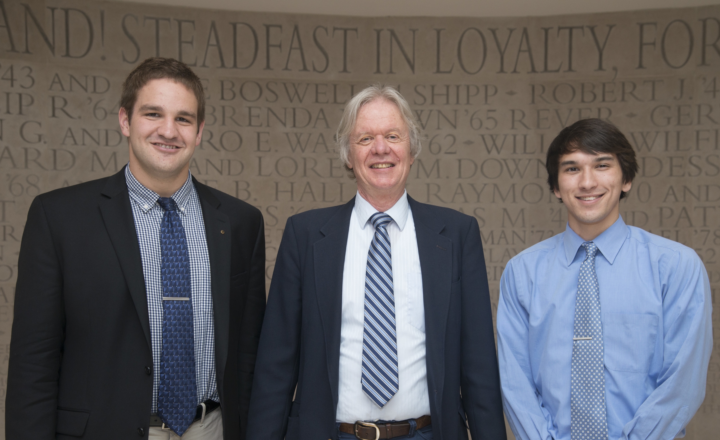 Shane Falcinelli, Dr. Todd Cooke, and Justin Buck at the Winston Family Honors Best Student Paper Awards at the Riggs Alumni Center.