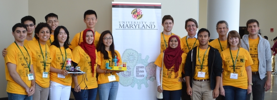 iGEMs student team at their national competition with Dr. Ed Eisenstein and Dr. Jason Khan.