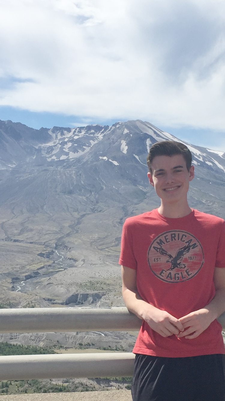 Picture of Brian Florenzo in front of a mountain overlook.