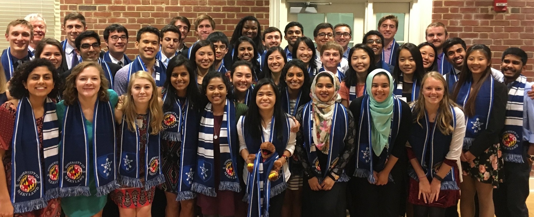 Picture of students receiving their ILS citations at the citation dinner.
