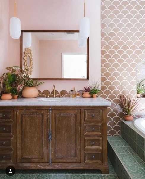 Love the touch of soft Moroccan glam these tiles add to the space. ( source )