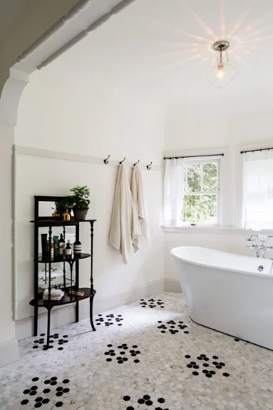 Love the mosaic, honeycomb flooring here . A modern spin on a classic look by Jessica Helgerson Interior Design.
