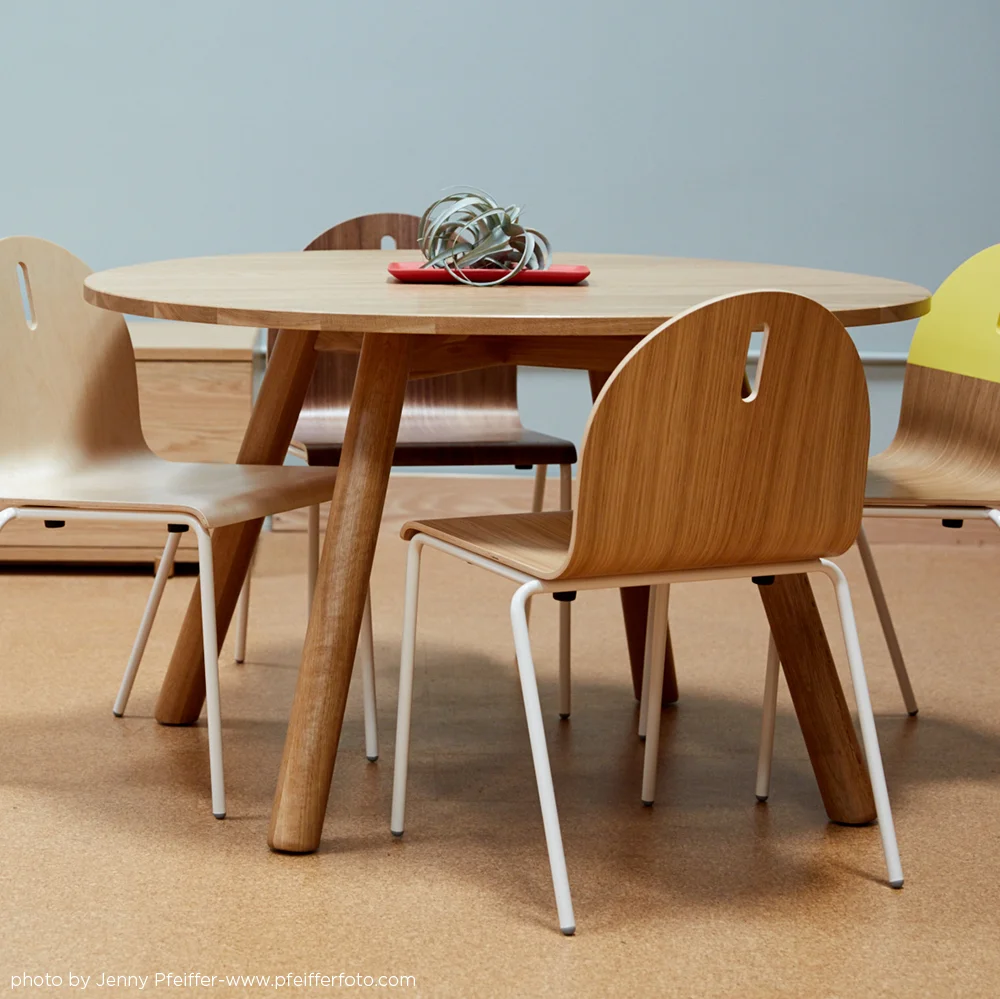 The legs of the batter tables were inspired by the blanks used to make baseball bats
