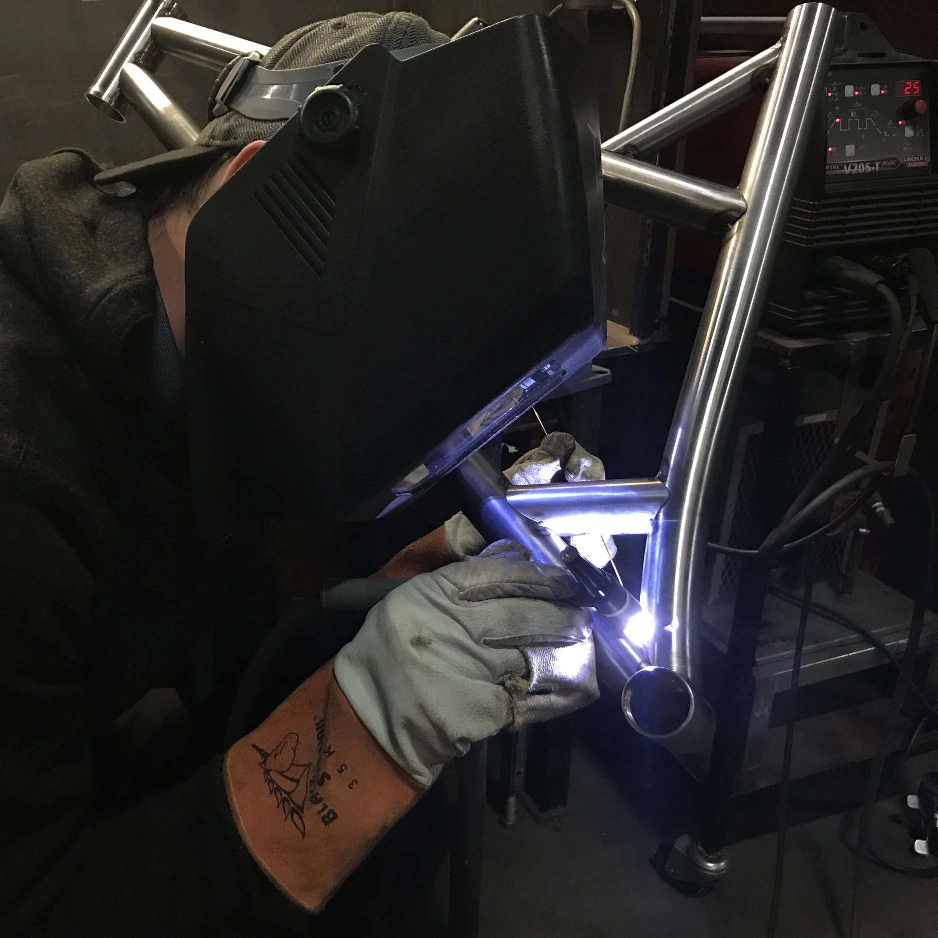  Once the main triangle is tacked together in the jig, the frame is then taken out of the jig for welding.  