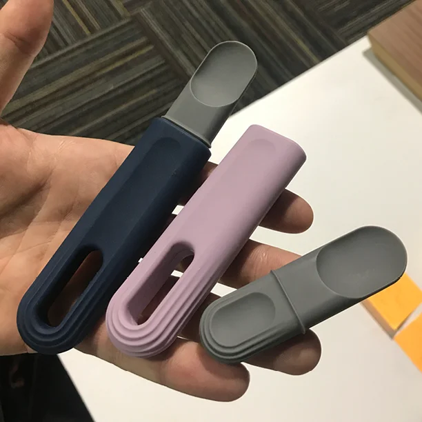  First prototypes in silicone showing the reversible spoon/ teether. 