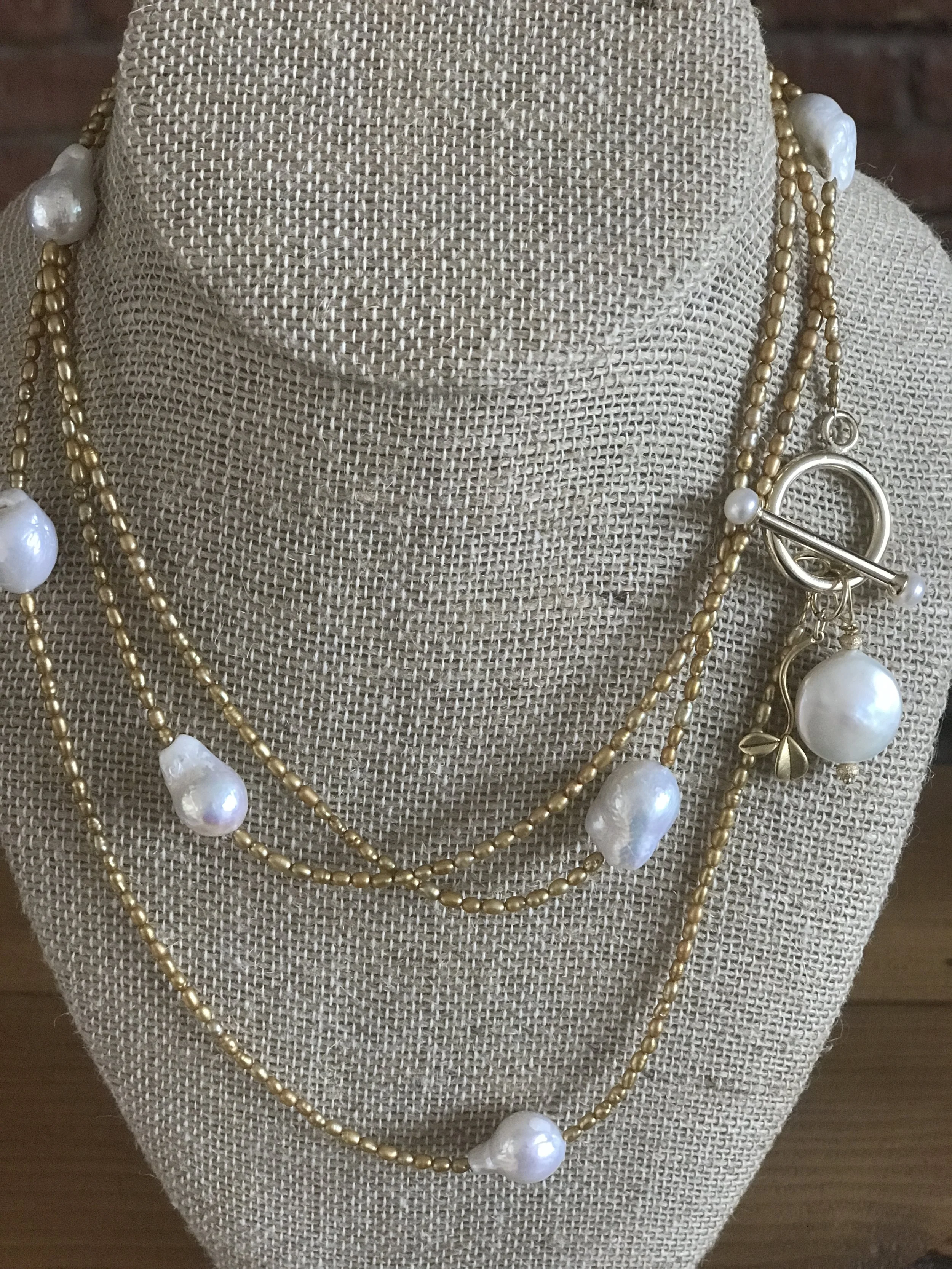Baroque & Seed gold pearls necklace with pearl toggle