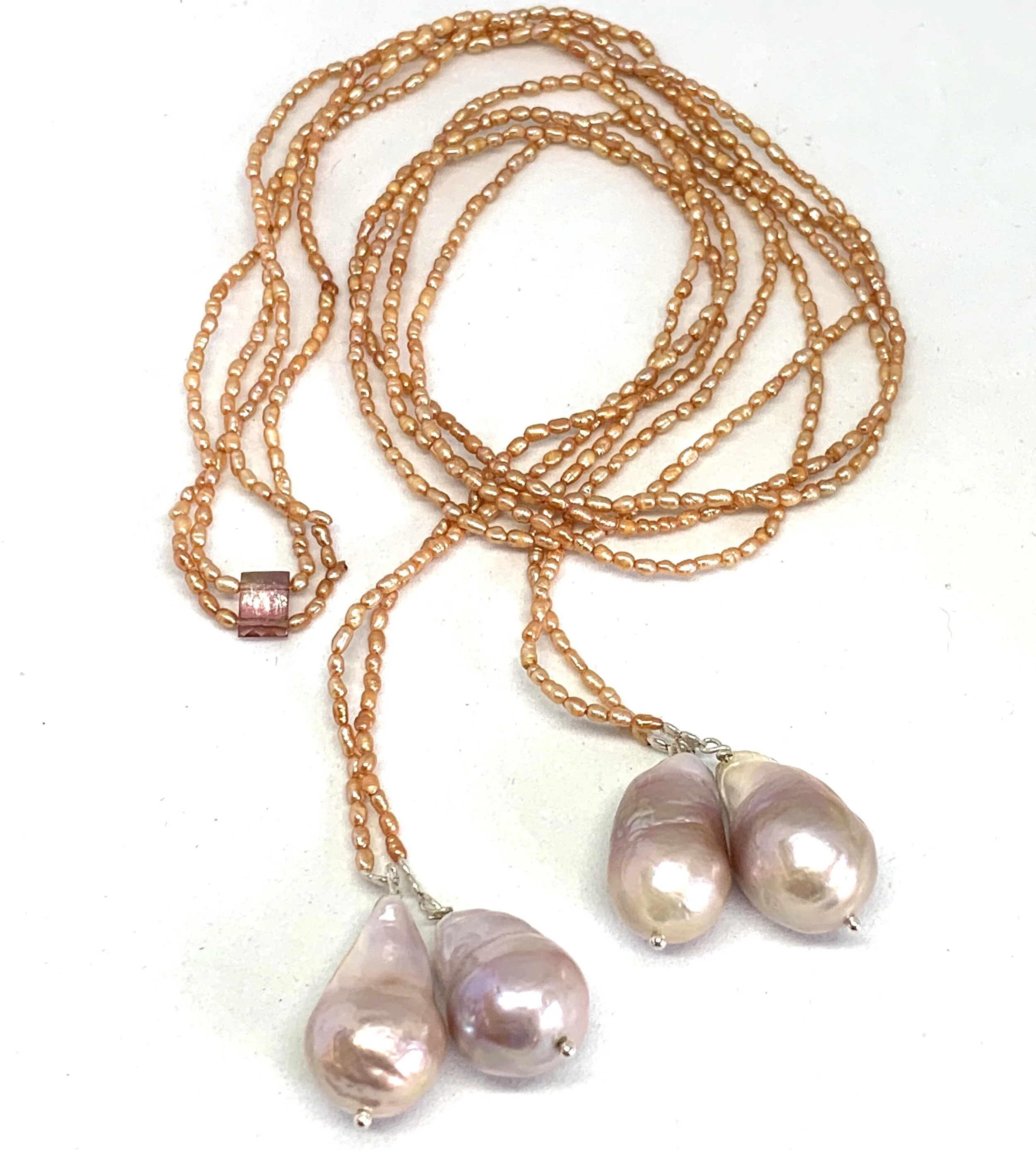 Double pearl lariat with peach seed pearls and tourmaline accent