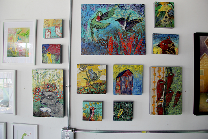 Anna's encaustic paintings flanked by Jee and Jenn's.