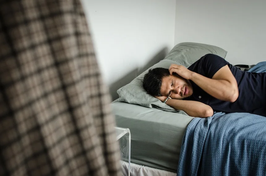 After one morning of campaigning, Edward Santos, city council hopeful for District 8, is worn out and falls into his bed. The 28-year-old high school teacher works from his home office with the help of several interns who are his former students.