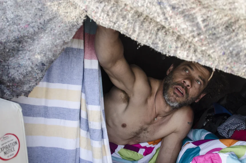 José Francisco opens up the curtain of his street home when he wakes up in the morning. He is homeless living under the Robert F. Kennedy Bridge in East Harlem. Originally from Puerto Rico, he has been in New York for four years and lives on collecting bottles and recycling them at the Pathmark on 125th Street and Lexington Avenue.