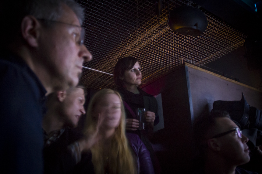 Oksana Neva, from St. Petersburg, Russia, stands quietly in the corner of a Hell's Kitchen bar, watching the opening ceremony of the 2014 Sochi Winter Olympics. Closeted to her family, Neva came to New York in July, 2013, with the idea of applying for asylum, following the path of many LGBT Russians who either have experienced or feared persecution or harassment back home. “I didn’t think about Putin and the corruption,” Neva said after the party. Instead, she appreciated the singers and dancers in the opening ceremony who shared her country’s history and culture of which she’s proud. She has since returned home to be an open lesbian and fight against discrimination toward the LGBT community there.