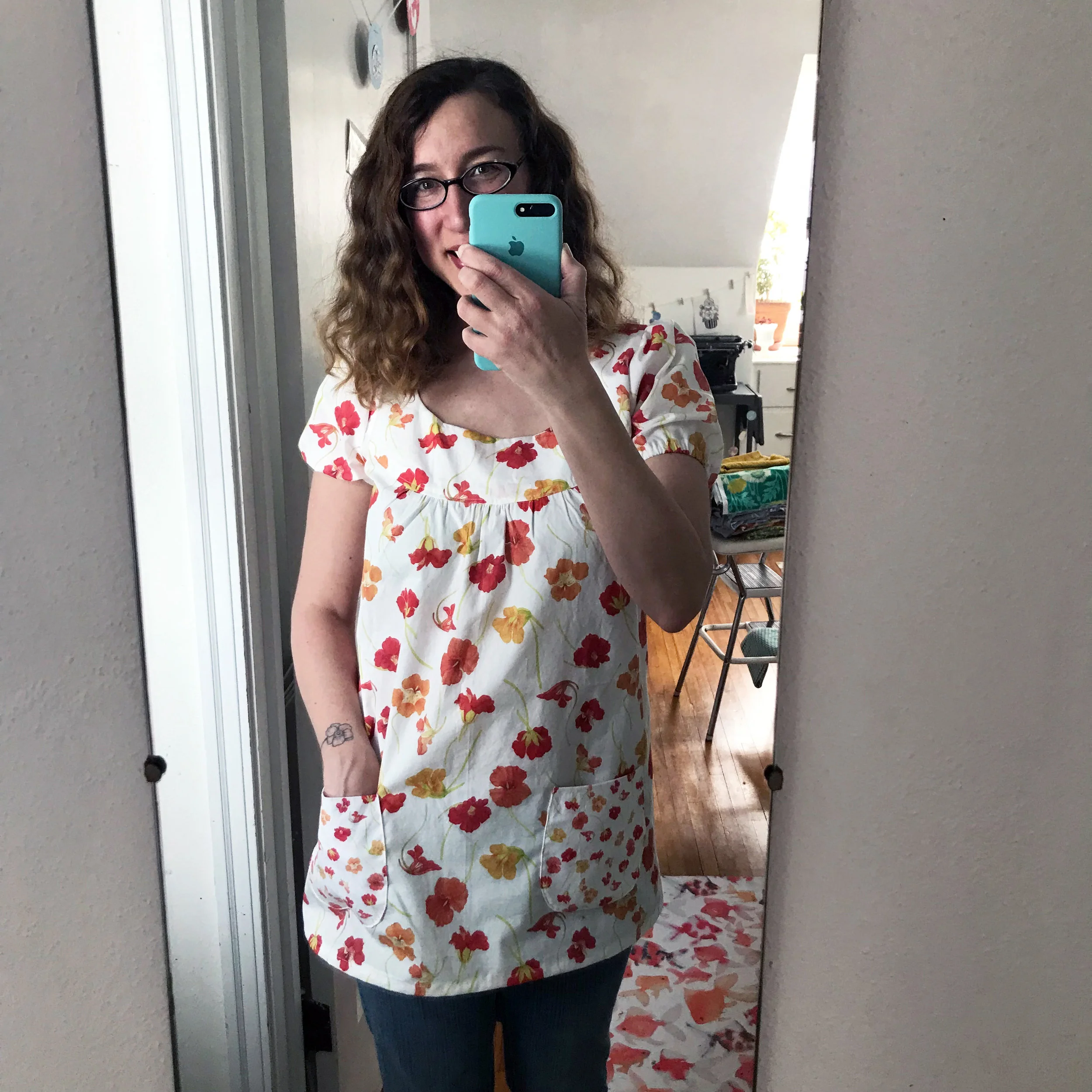 I used two scales of my watercolor nasturtiums fabric from Spoonflower to sew this version of McCalls 5388. I added pockets and lengthened the top to make it more of a tunic.
