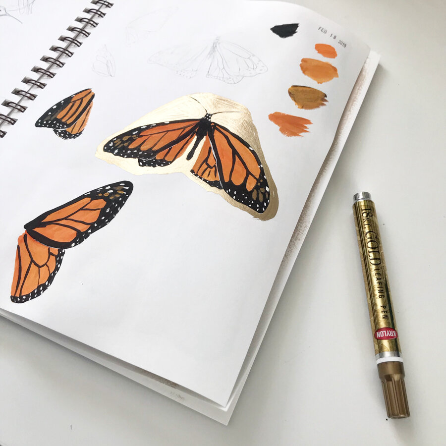  Monarch butterflies in my sketchbook done in pencil and paint and embellished with gold leaf. 