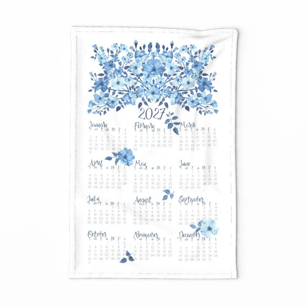 Anne Butera's 2027 Tea Towel Calendar illustrated with beautiful roses painted in shades of blue watercolor