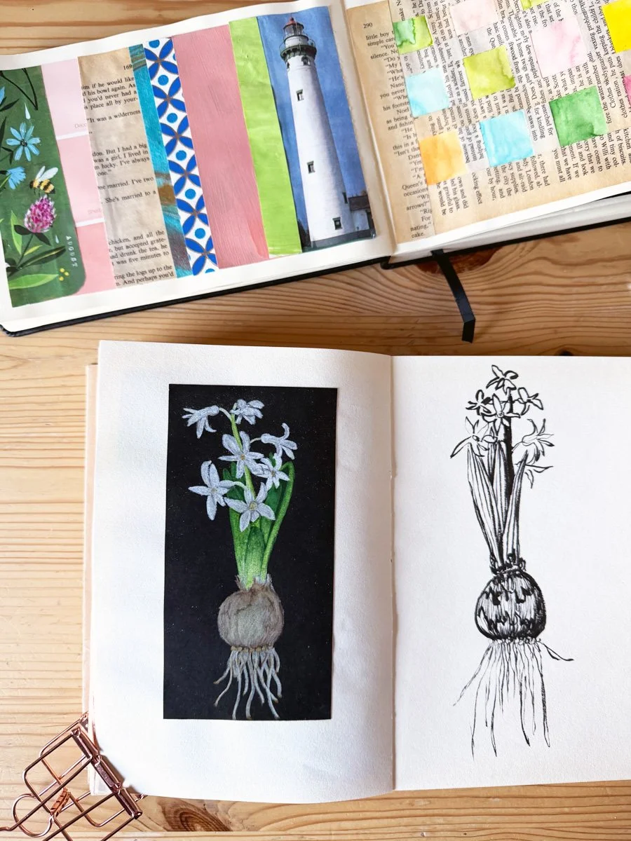 two sketchbooks with a variety of mediums on Anne Butera's painting table