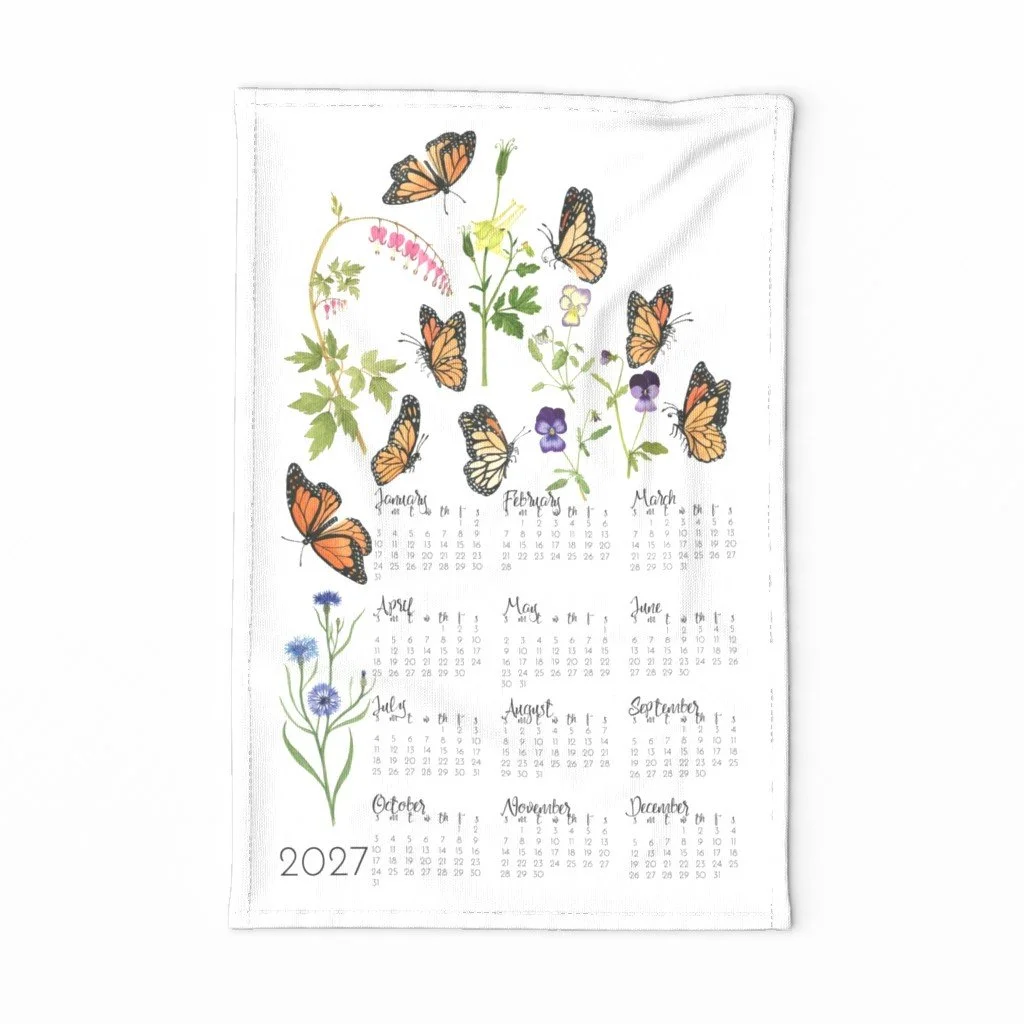 a garden filled with monarch butterflies adorn this beautiful tea towel calendar from artist Anne Butera