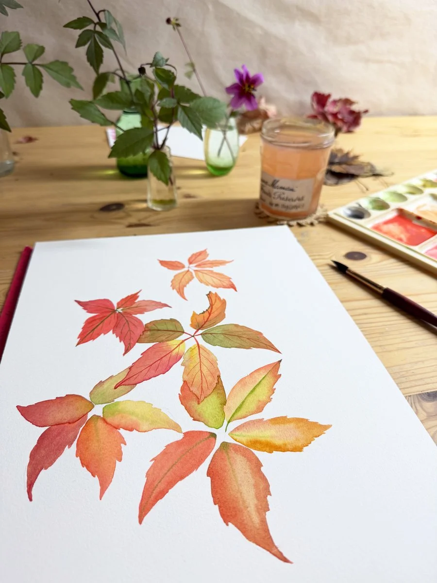 Anne Butera's Virginia Creeper watercolor painting in progress on her painting table