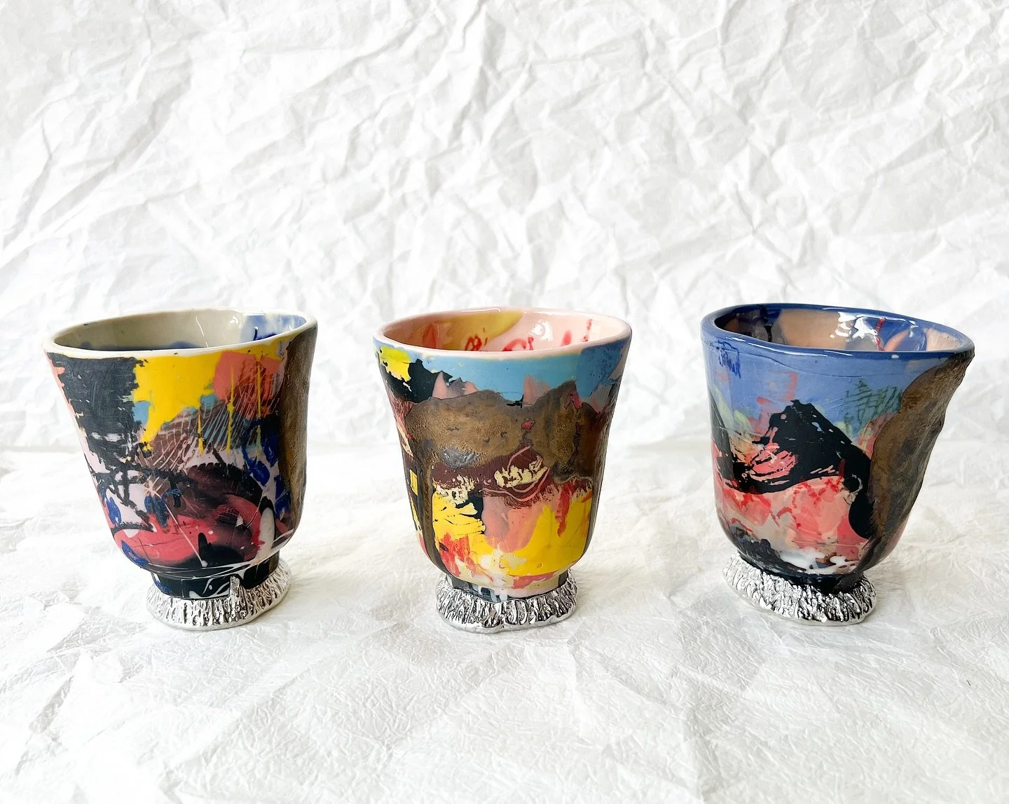 New work…something a bit different…
“Timber Creek, NT”
Porcelain slip, dads bronze glaze, clear glaze, homemade crayons, underglaze pencils, pewter 
As part of the MANY cups/mugs/vessels/artworks for sale at:
COMMUNITY O