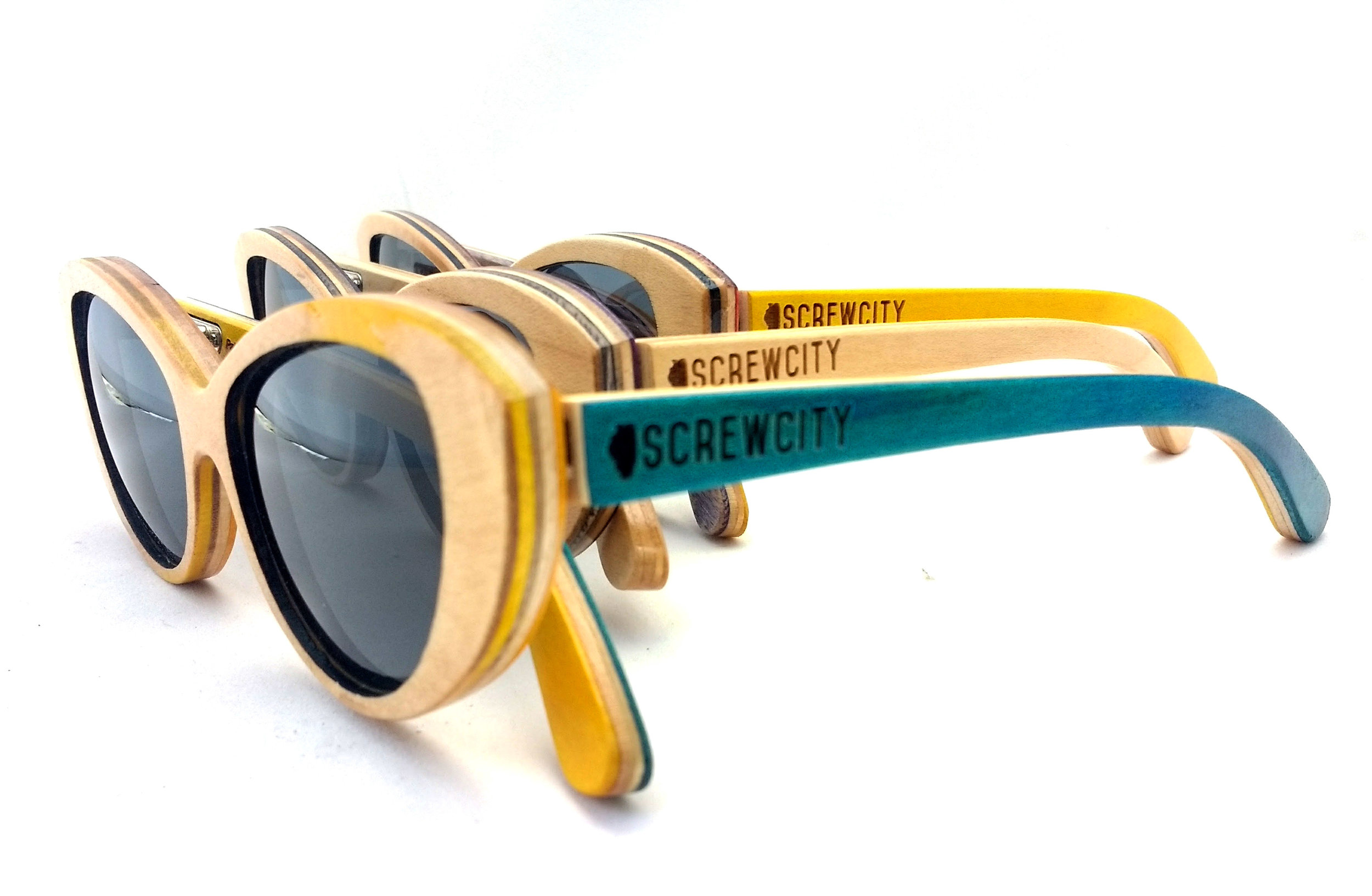 Yellow, Blue and Natural Mariana SK8Glasses™ with logos